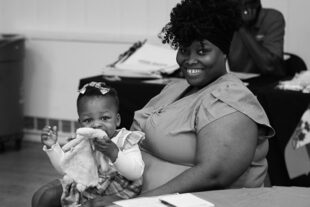 Mother and daughter smiling